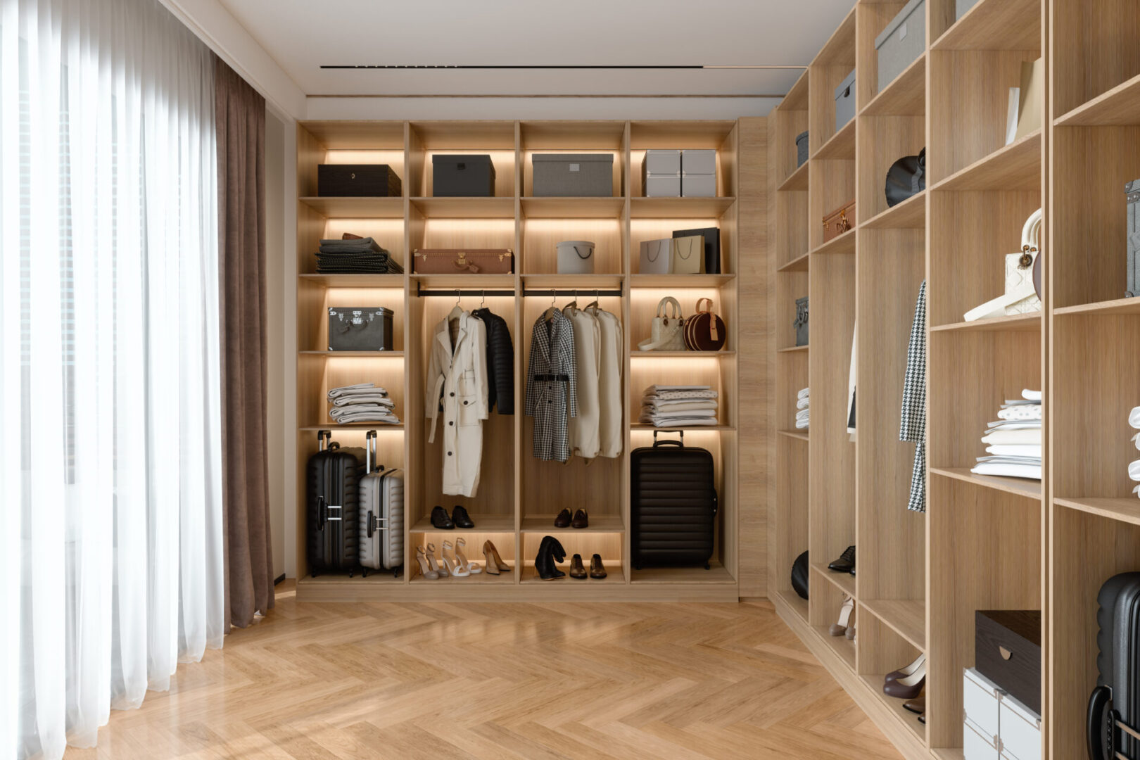 A walk in closet with wooden shelves and lighting.